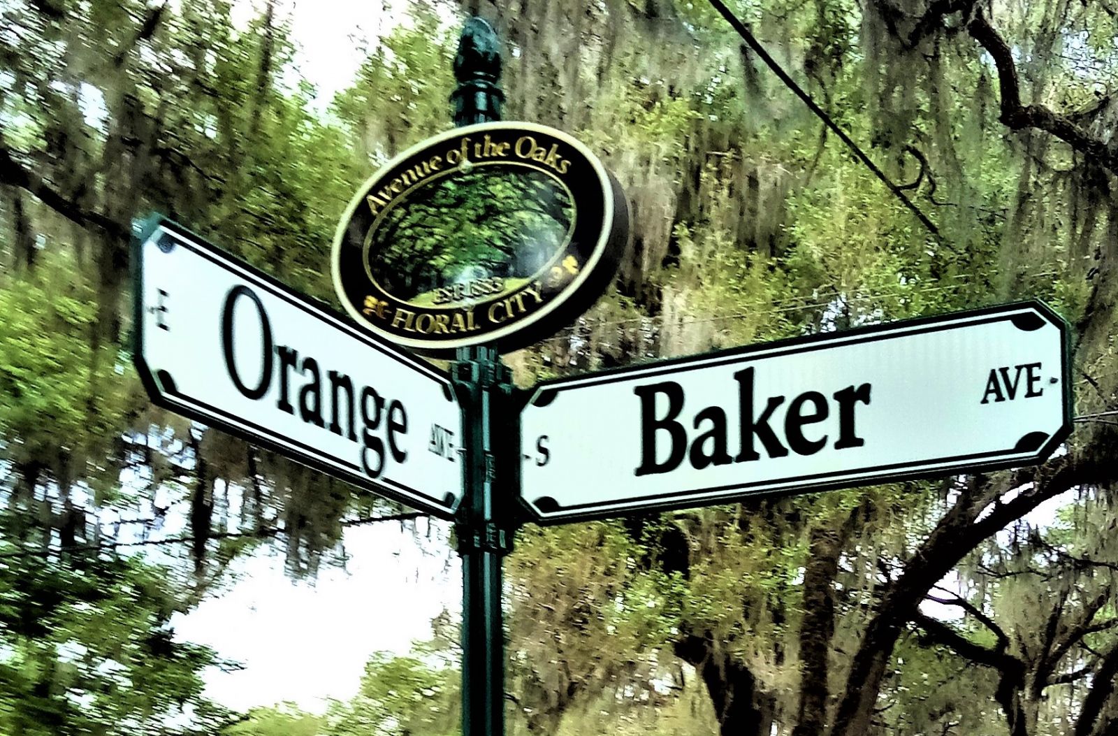 street signs at corner of Baker St and Orange Ave